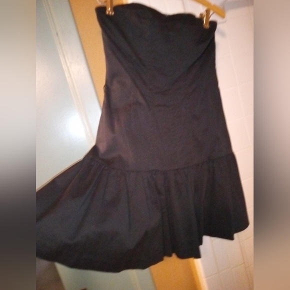 Express Dresses & Skirts - Express black strapless dress with bottom ruffle